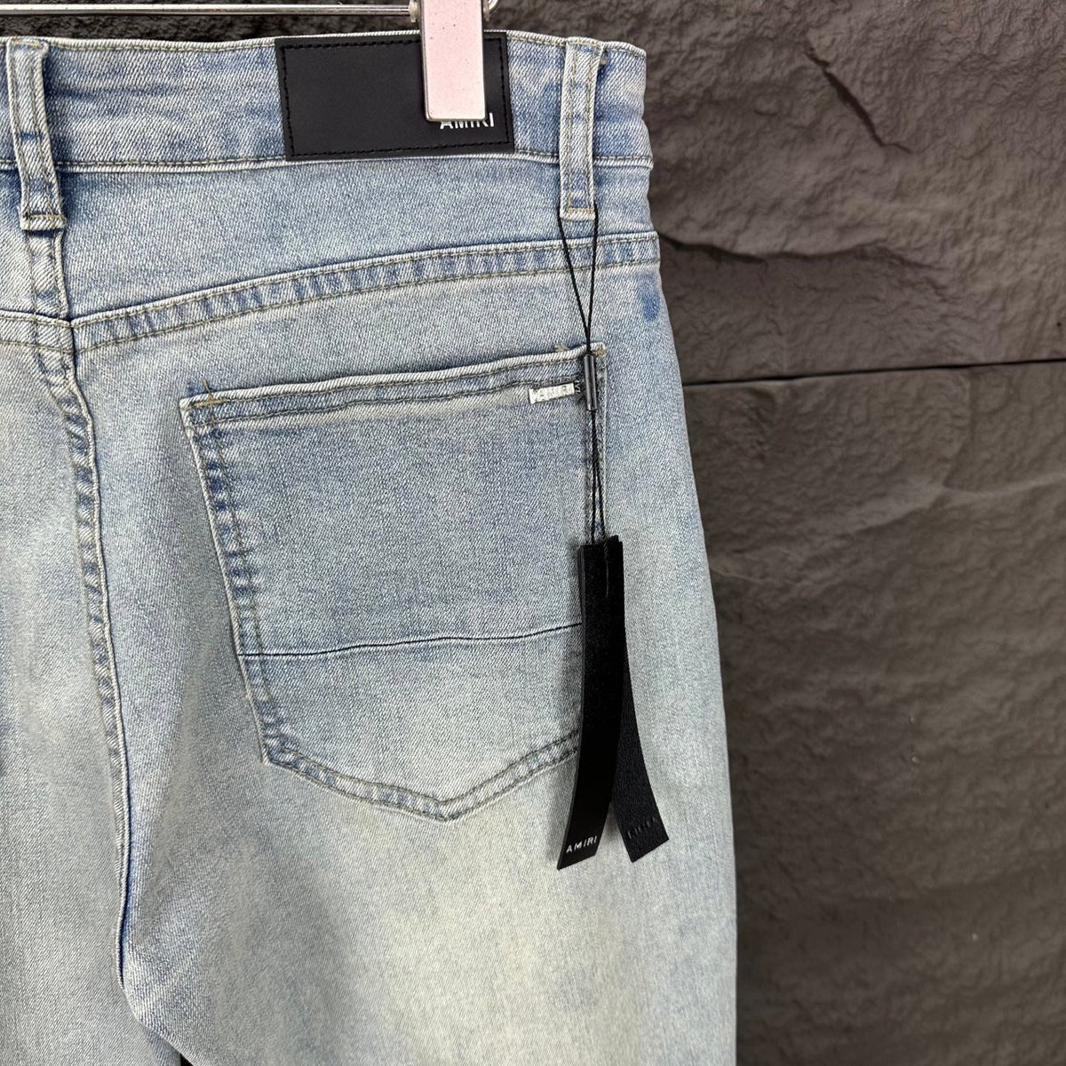 AMIRI Black Ribbed Patch Distressed Slim‑Fit Denim Jeans